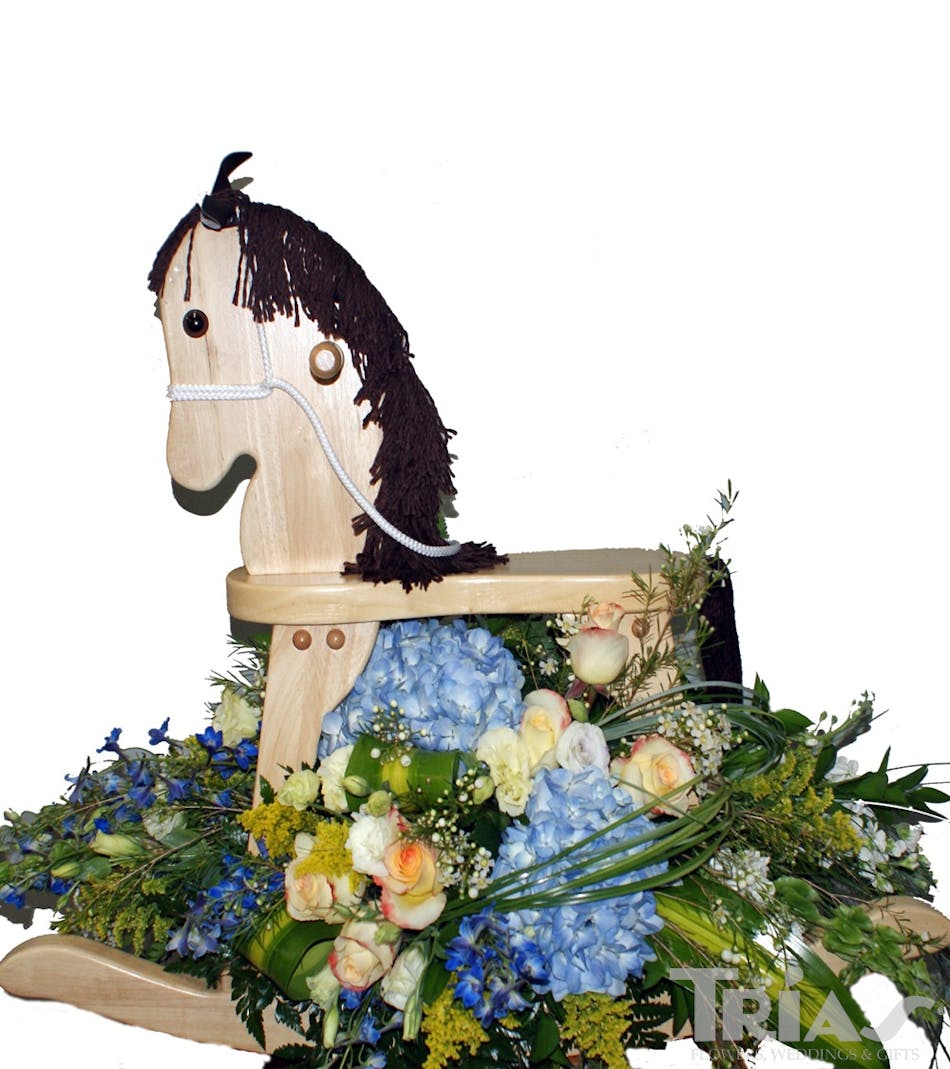 Rocking Horse with Flowers Flowers and an keepsake. Miami Flowers